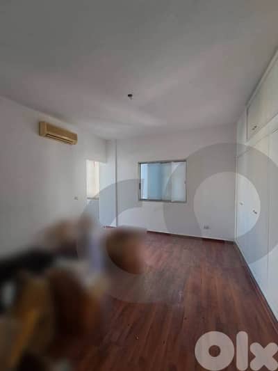 fully renovated building,6 balconies -open view- Badaro REF#KE126948