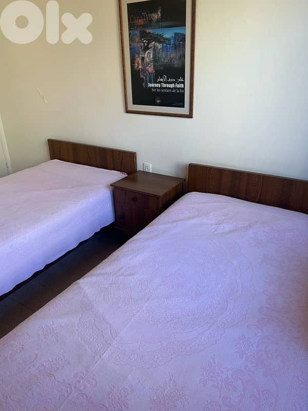 2 single beds + 2 mattresses + nightstand in good condition 0