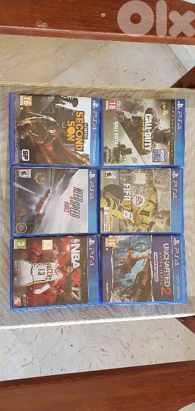 Sony PS4 1 TB like new, with 2 controllers, with 6 original DVDs 3