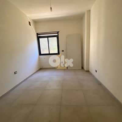 Apartment for sale in Ballouneh GH110 شقة  للبيع في بلونة