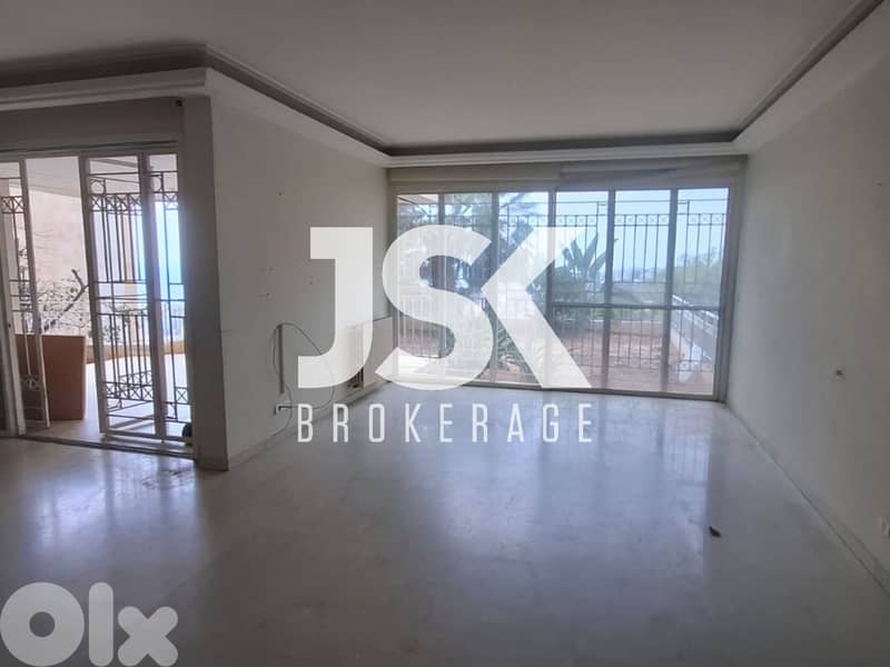 L19408 - Spacious Apartment with Terrace & Garden For Sale in Bsalim 0