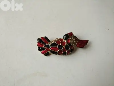 Old bird brooch - Not Negotiable