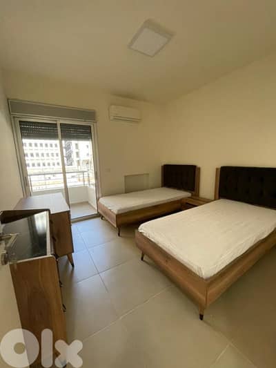 L19484 - Furnished 2-Bedroom Apartment For Sale in Achrafieh, Lycée