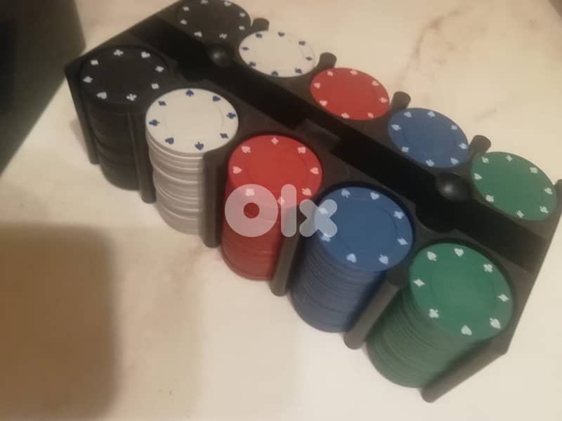 Things Texas hold em 200 Poker chips plus 2 used playing cards 2
