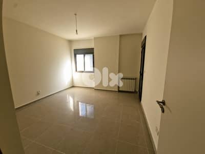 L19587 - Spacious Apartment For Rent in Kfarhbeib