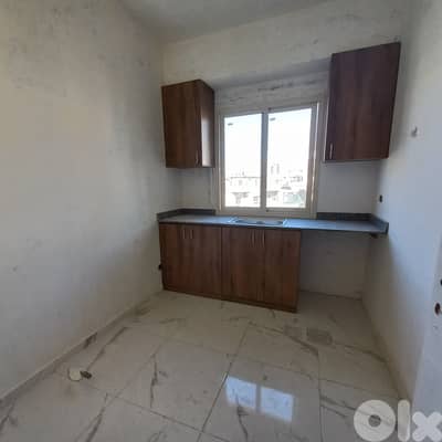 New Built apartment in new building for saleشقة جديدة في مبنى جديد للب