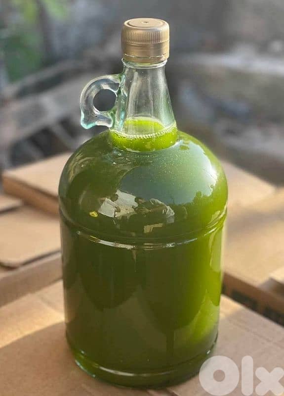Olive oil premium pure 100% . . . %زيت زيتون أصلي ١٠٠ 0