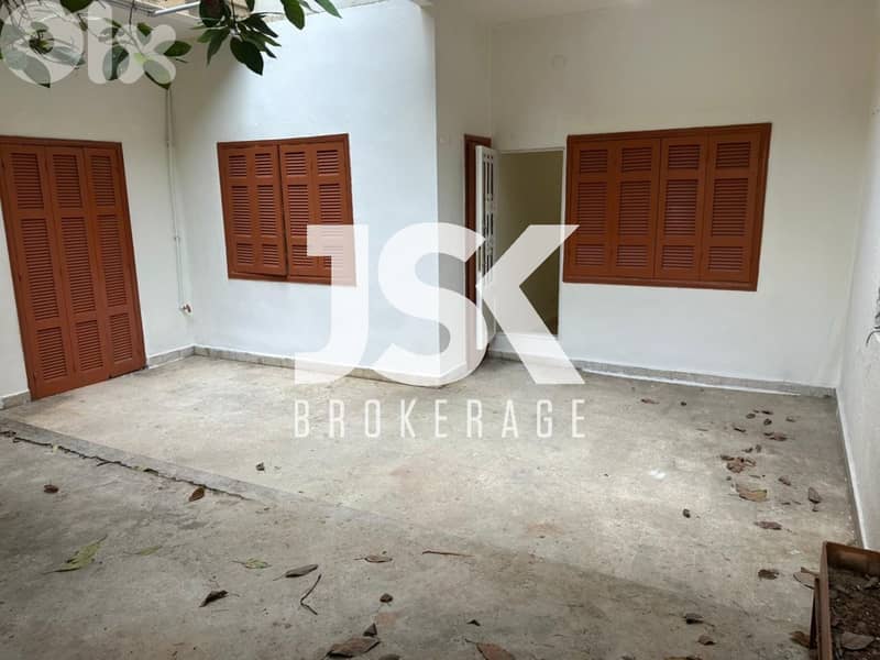 L19657 - Spacious Apartment with Terrace For Rent in Antelias 0