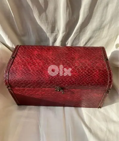 burgundy leather chest