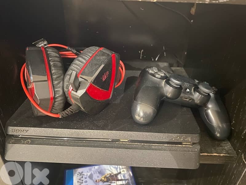 ps4 slim with 12 games and 1 controller 0