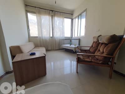 Chalet for rent in Faraya with balcony and mountain view.