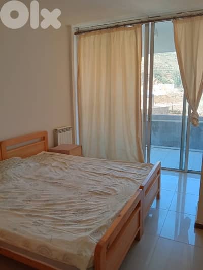 Chalet for rent in Faraya with balcony and mountain view.