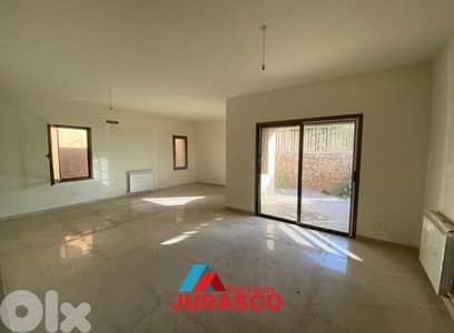apartment for sale in ballouneh 180m + 110m garden/ شقة للبيع في بلونة