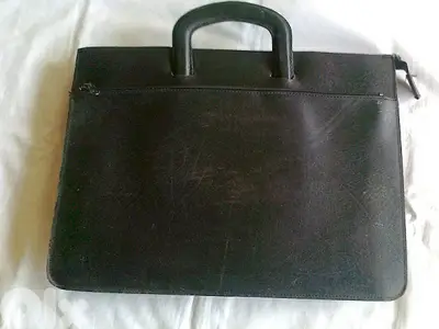 Old leather suitcase - Not Negotiable