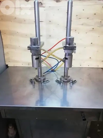 مكنة تعبئة زيوتsemi automatic filling machine