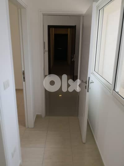 L19784 - 2-Bedroom Apartment For Sale in Fanar Gated Community