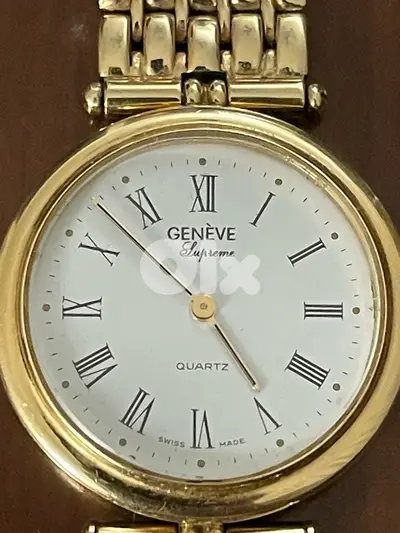 14k solid gold 0.585 Genève made in Italy for men, 33.5mm. 68.3 grams.