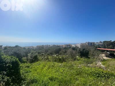Land For Sale In Amchit With an Old House  - أرض للبيع في عمشيت