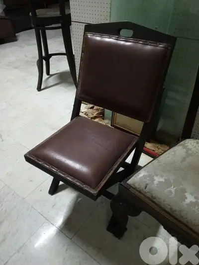 teak wood and authentic leather chair