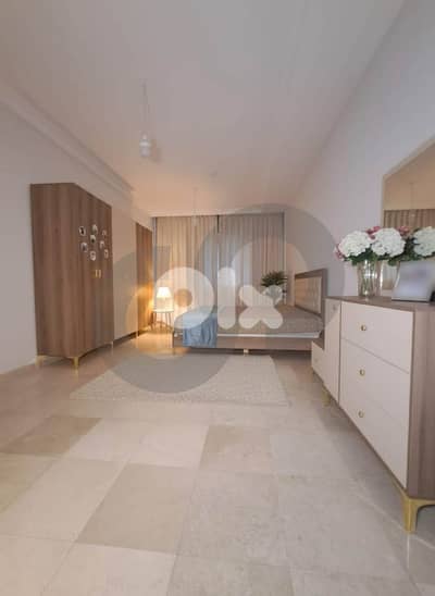 spacious apartment for rent in Bir Hassan/بئر حسن REF#UK130108