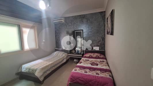 Fully Furnished apartment with view for sale -Mansourieh REF#PH128427