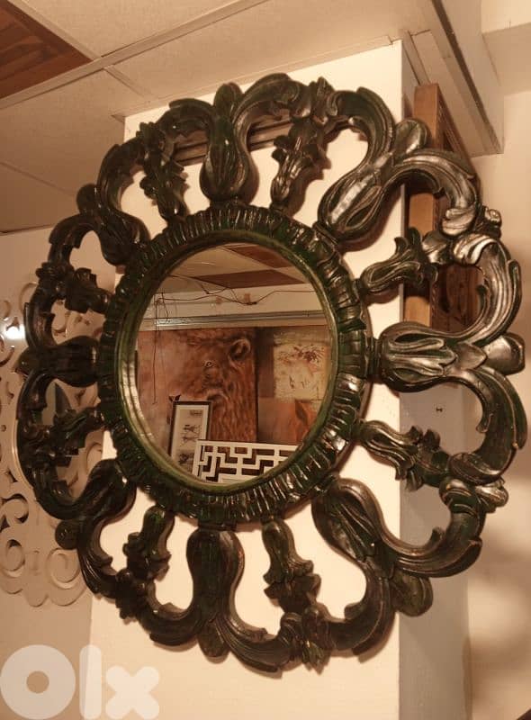 carved jade mirror with gold patina 0