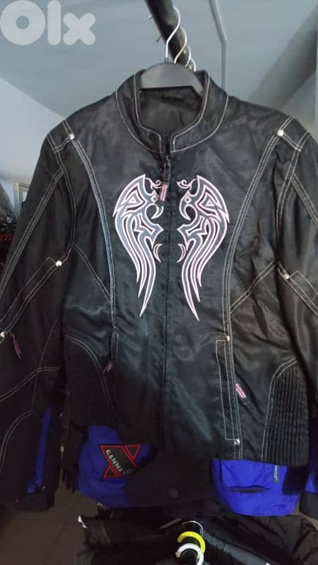 moto vest and pants 20$ 8