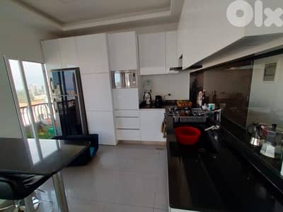 L19964 - Apartment with Sea & City View For Rent in Mar Mikhael