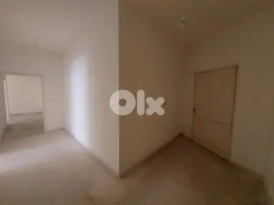 شقة سكنية في بناية سنتر مسعود على ساحة حلبا - عكار