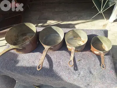 مجموعة مقالي للطهي نحال احمر صنع الماني القديم