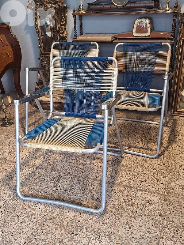vintage foldable chrome chairs 0