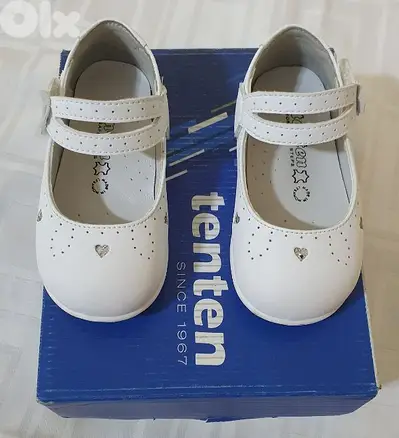Baby shoes  white original leather  &  used  one  time  only  size  21