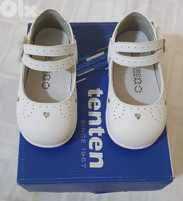 Baby shoes  white original leather  &  used  one  time  only  size  21 0