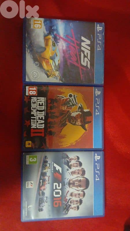 red dead redemption 2 + need for speed heat + f1 2016 CD Disk 0