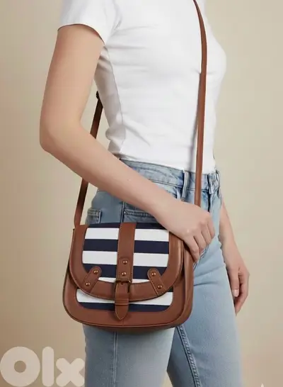 navy and brown stripped cross bag