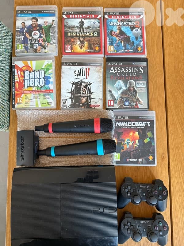 PlayStation 3 Console Bundle + SingStar Mics + Games (Barely Used) 0