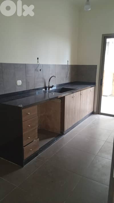 GMB105EM - Apartment for sale in Amchit - شقة للبيع في عمشيت