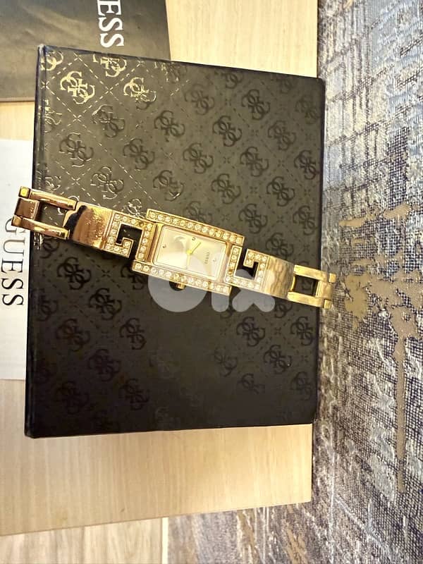 new guess gold watch with box and warranty card from abc department 0
