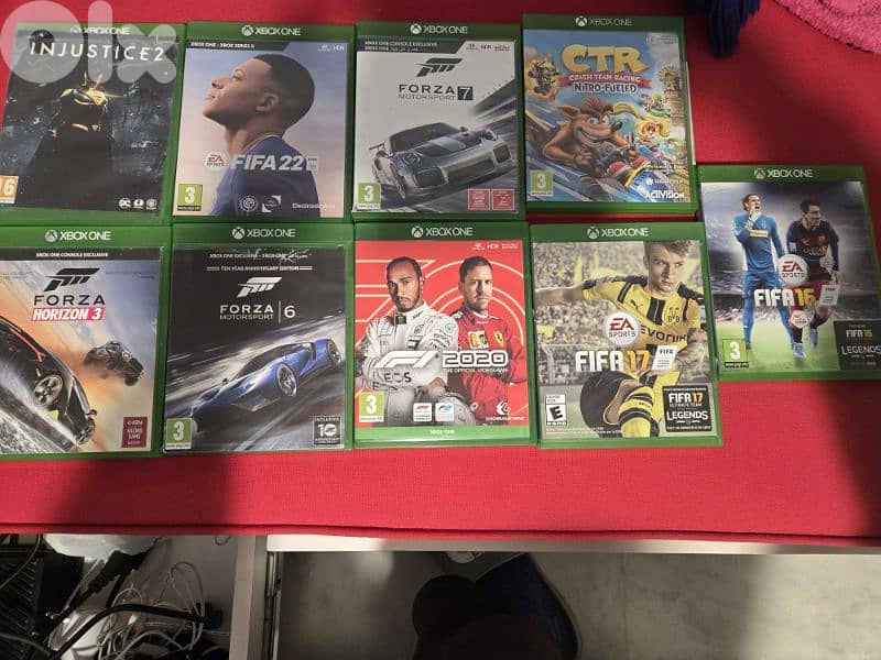 xbox one with full set (original camera, wheel and pedals) and 9 games 2