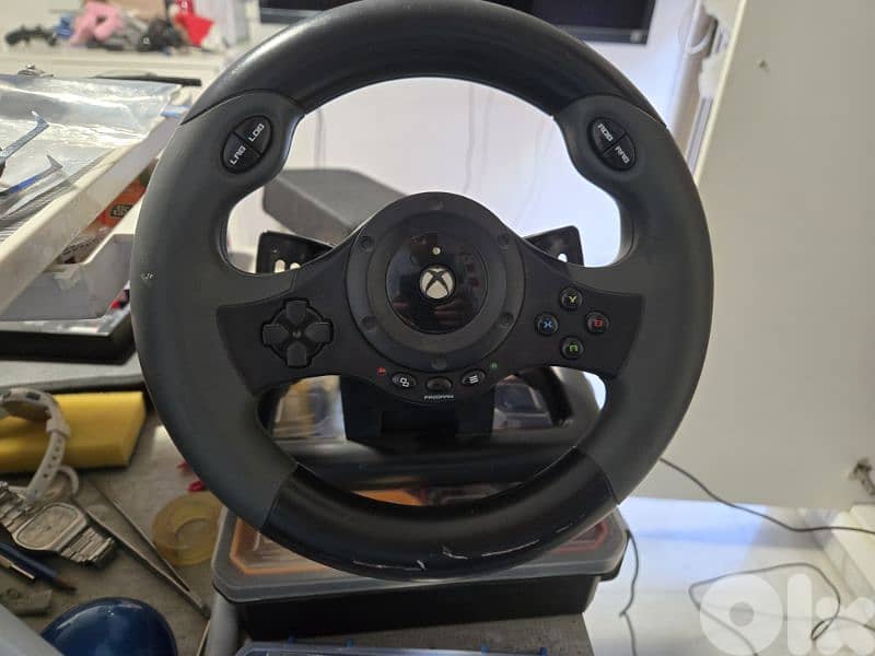 xbox one with full set (original camera, wheel and pedals) and 9 games 0