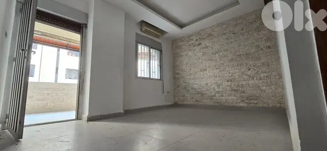 Apartment For Sale in Ballouneh - شقة للبيع في بلونة