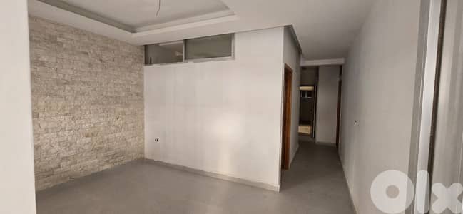 Apartment For Sale in Ballouneh - شقة للبيع في بلونة