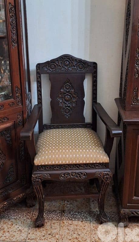 complete dining table and 8 chairs (2armchairs)  2 showcases 3