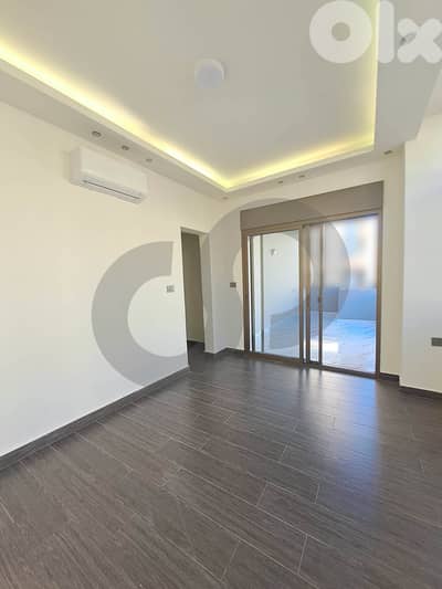 Direct Garden View spacious  in Sanayeh/صنايع REF#YJ130981