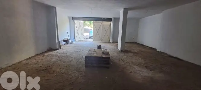WAREHOUSE FOR RENT IN MANSOURIEH PRIME WITH TERRACE, (MANR-293)