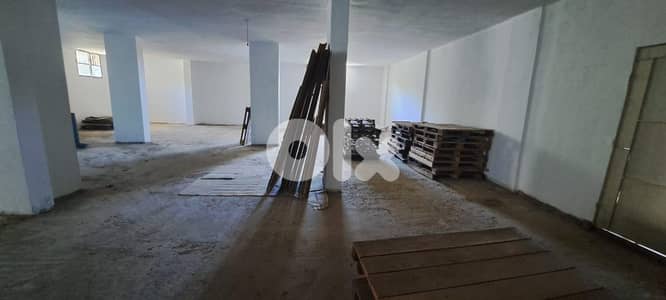 WAREHOUSE FOR RENT IN MANSOURIEH PRIME WITH TERRACE, (MANR-293)