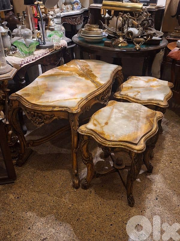 3 tables set wood and marble on top 0