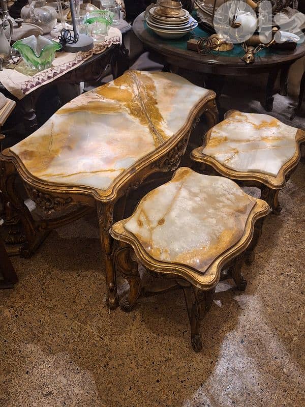 3 tables set wood and marble on top 3