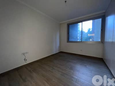 L20081 - Apartment For Rent in a High-End Building in Achrafieh L20081 - Apartment For Rent in a High-End Building in Achrafieh