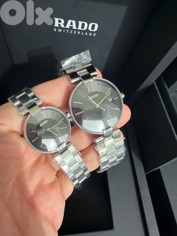 2 Rado Coupole stainless steel watch with a black dial 0